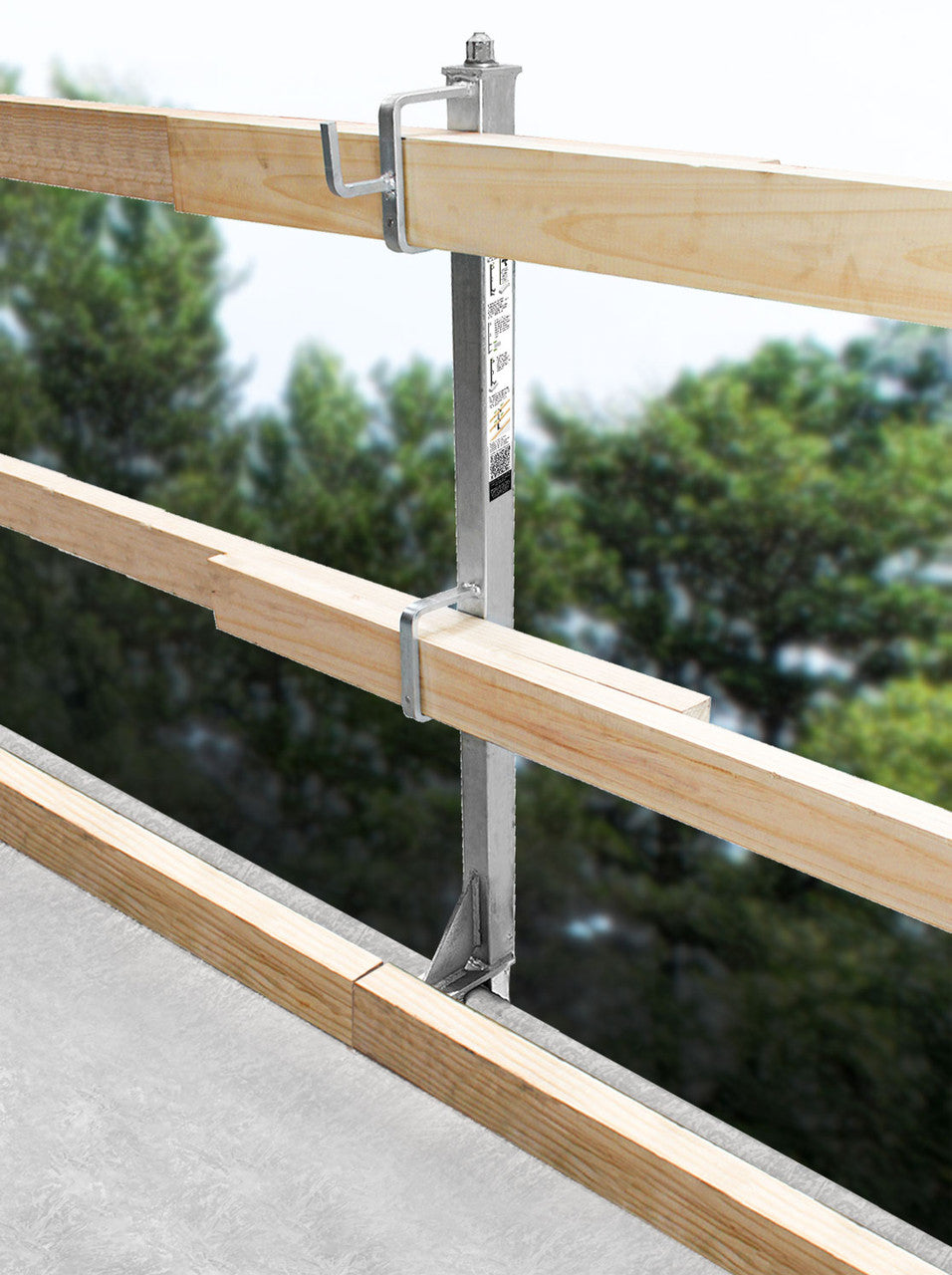Frontline Slab Grabber clamped to a concrete slab edge with 2x4 rails