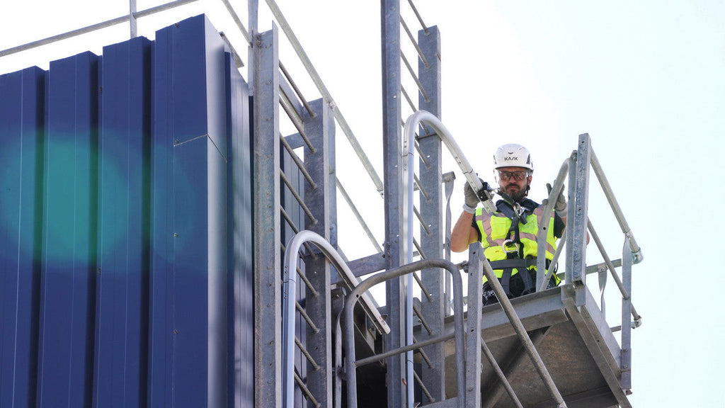 Frontline SecuRail Pro rail at the top of a roof access ladder